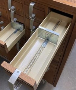 Hole at the Bottom of Catalog Cards
